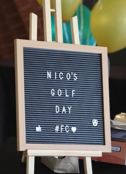 A letterboard announcing Nico’s golf day